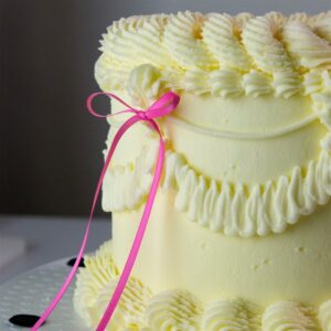 Afbeelding van roze lintstrik taarttoppers van PME